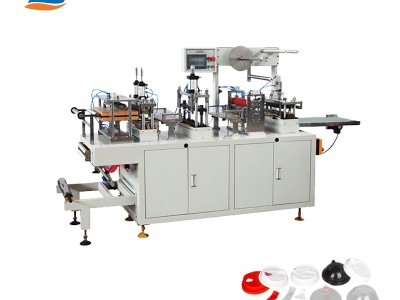 Plastic lids making machine