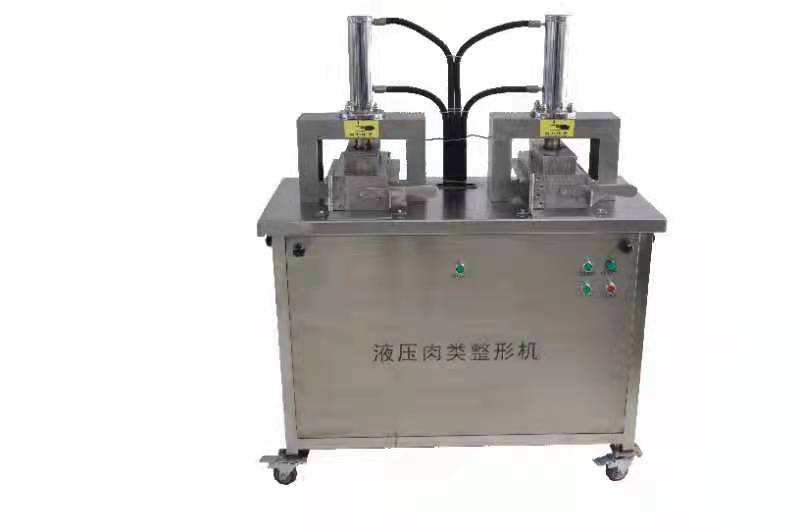 Hydraulic meat shaping machine