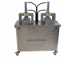 Hydraulic meat shaping machine