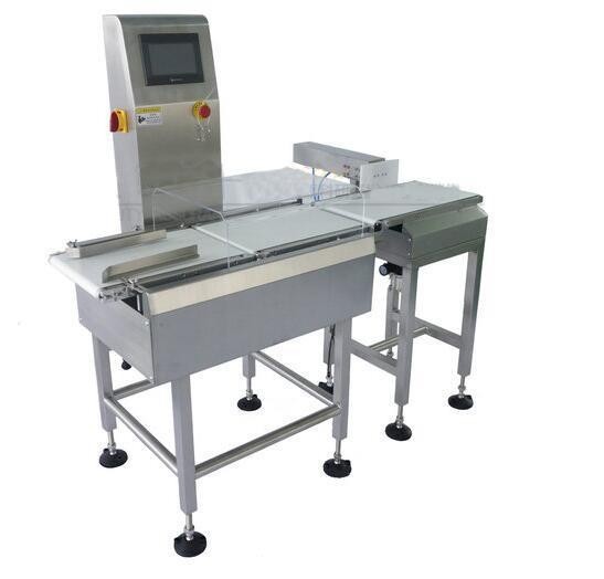 Machine with weighing device
