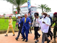 Ugandan President Yoweri Museveni cuts ribbon at four 